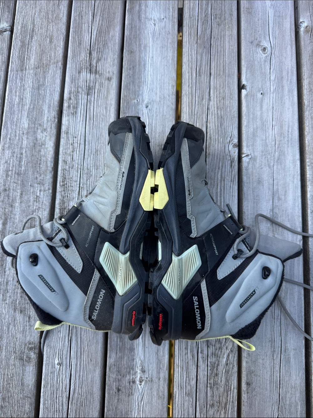 Salomon Women’s Gray and Black Hiking Boots with Pale Yellow Accents